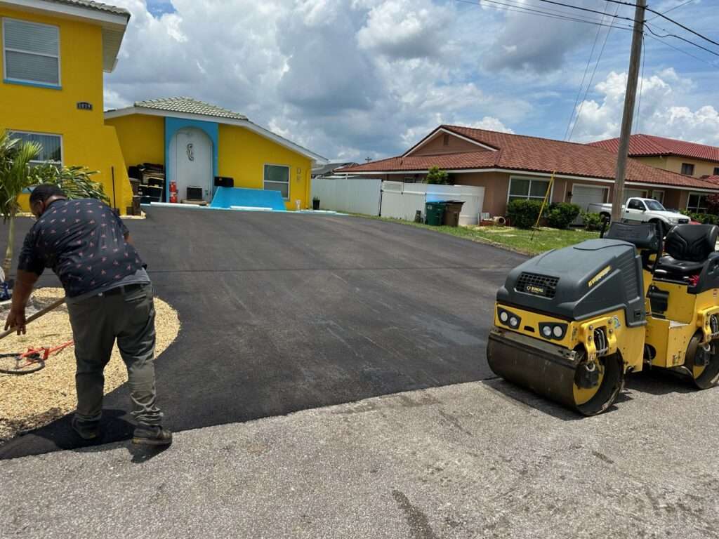 Recently asphalt paved driveway.