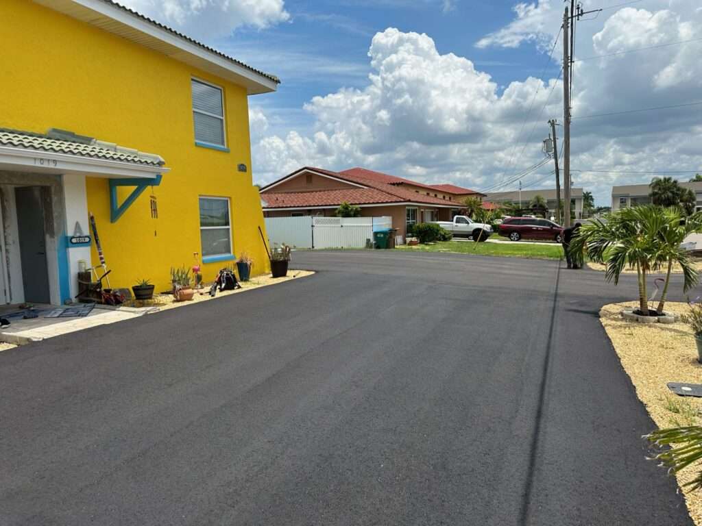 Recently asphalt paved driveway.