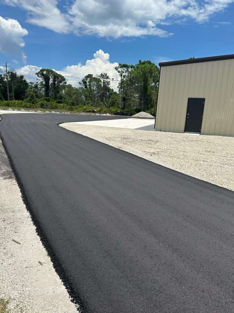Recently asphalt paved driveway.