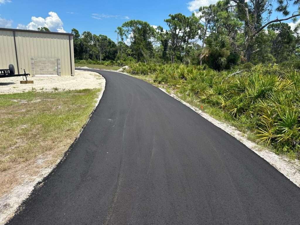 Recently asphalt paved driveway.